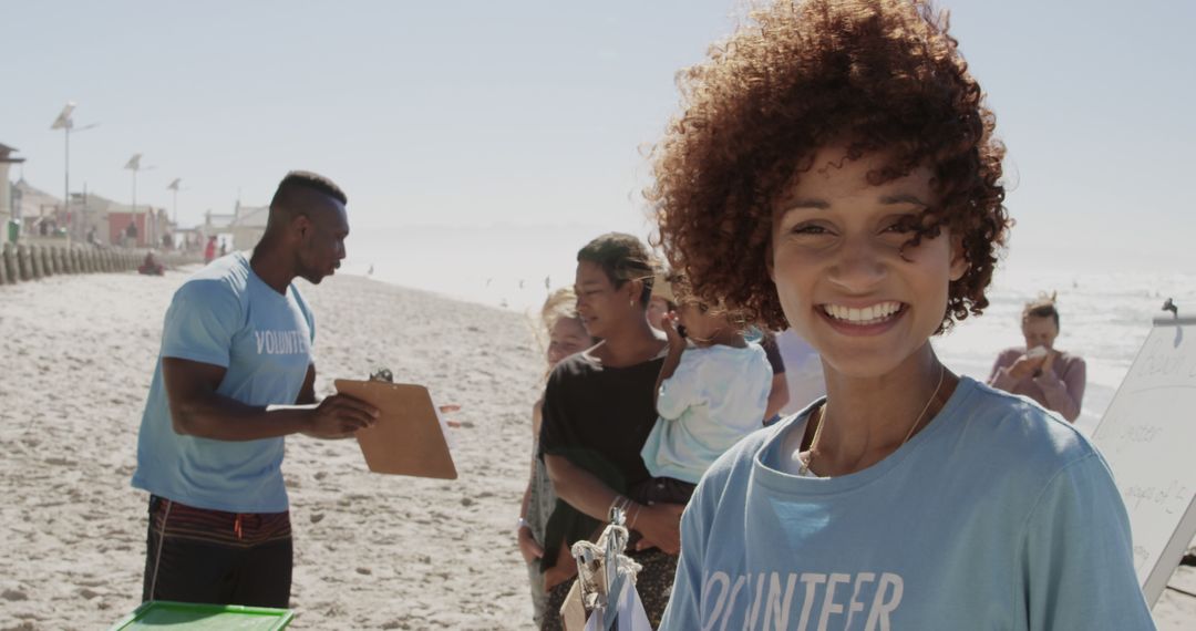 Group of Volunteers Organizing Beach Cleanup Event - Free Images, Stock Photos and Pictures on Pikwizard.com