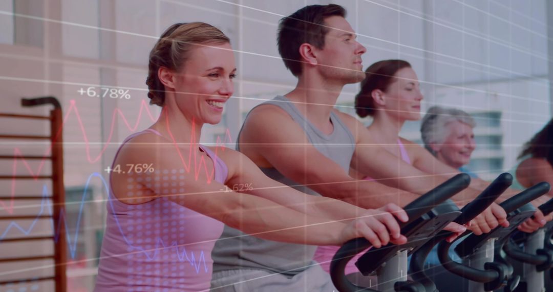 Mixed-age group pedaling on stationary bikes in spin class with fitness metrics overlay