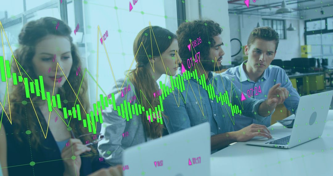 Young Professionals Analyzing Financial Data in Modern Office - Free Images, Stock Photos and Pictures on Pikwizard.com