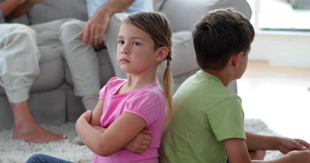 Upset Children Sitting Back-to-Back on Floor during Conflict - Free Images, Stock Photos and Pictures on Pikwizard.com