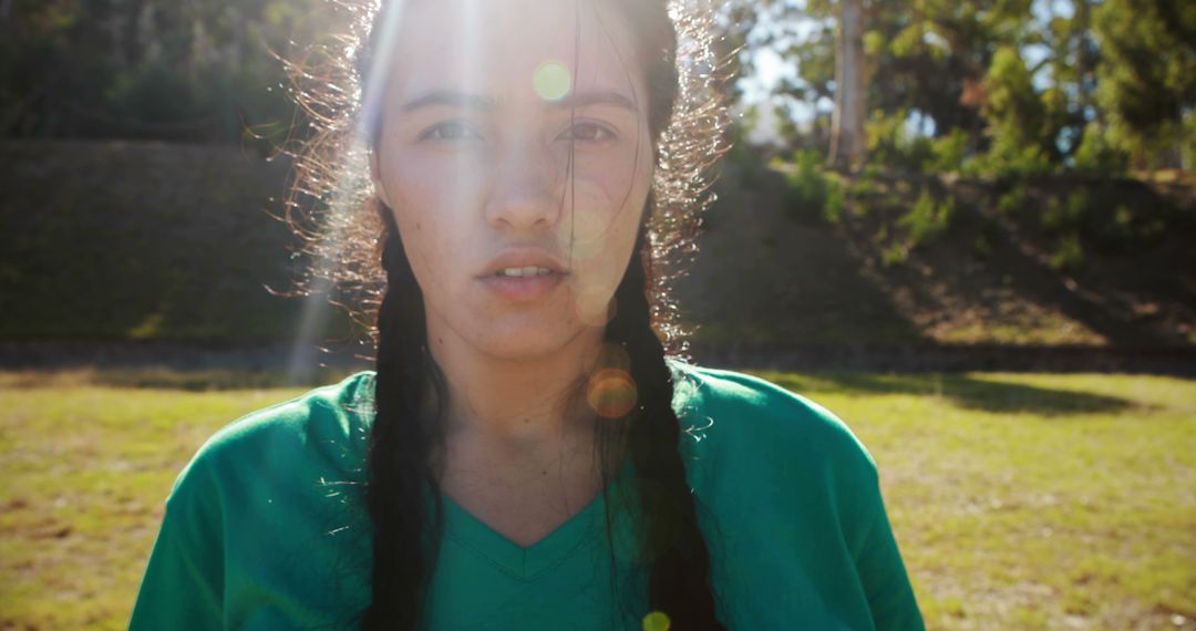 Young Woman in Sunlit Outdoor Setting Looking Asks Question - Free Images, Stock Photos and Pictures on Pikwizard.com