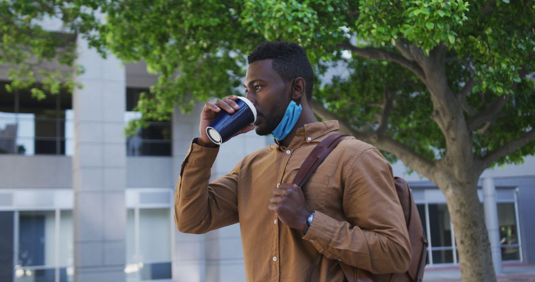 Urban Professional Enjoying Coffee while Social Distancing