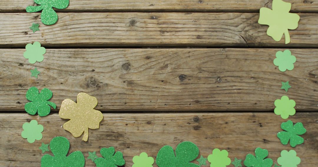 St. Patrick's Day Shamrock Decorations on Wooden Background - Free Images, Stock Photos and Pictures on Pikwizard.com