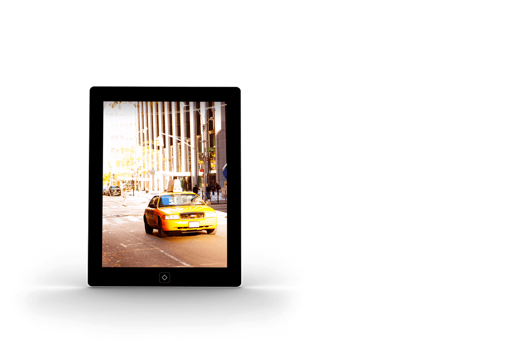 Yellow Taxi Displayed on Transparent Tablet Screen