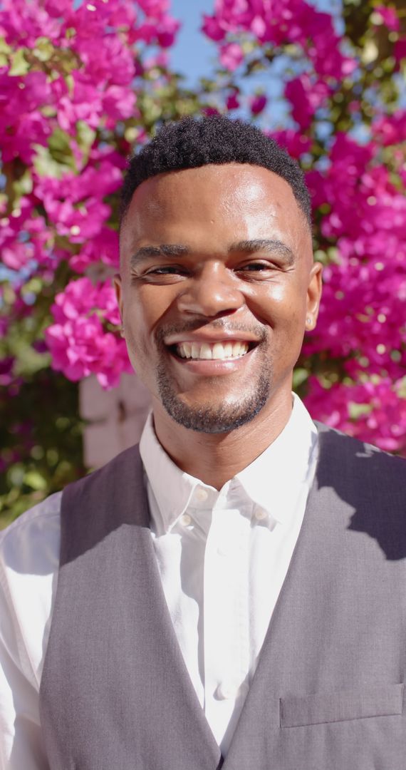 Joyful Smiling Man in Vest on Bright Wedding Day