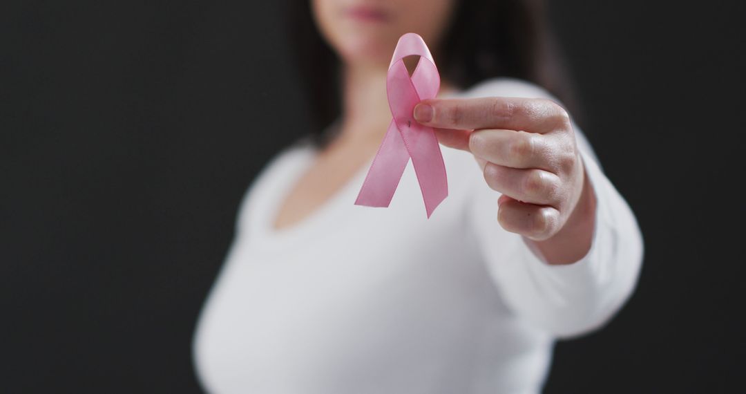 Woman Holding Pink Ribbon Breast Cancer Awareness - Free Images, Stock Photos and Pictures on Pikwizard.com