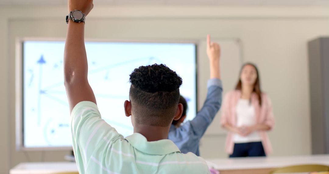 Engaged High School Students Joining Class Discussion