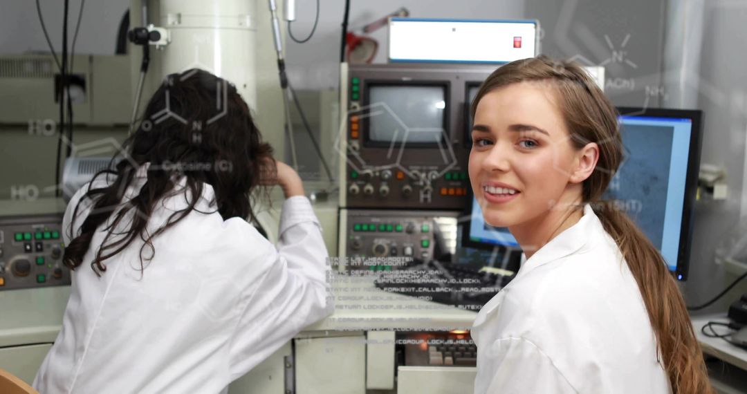 Female Scientists Collaborating in High-Tech Laboratory with Equipment