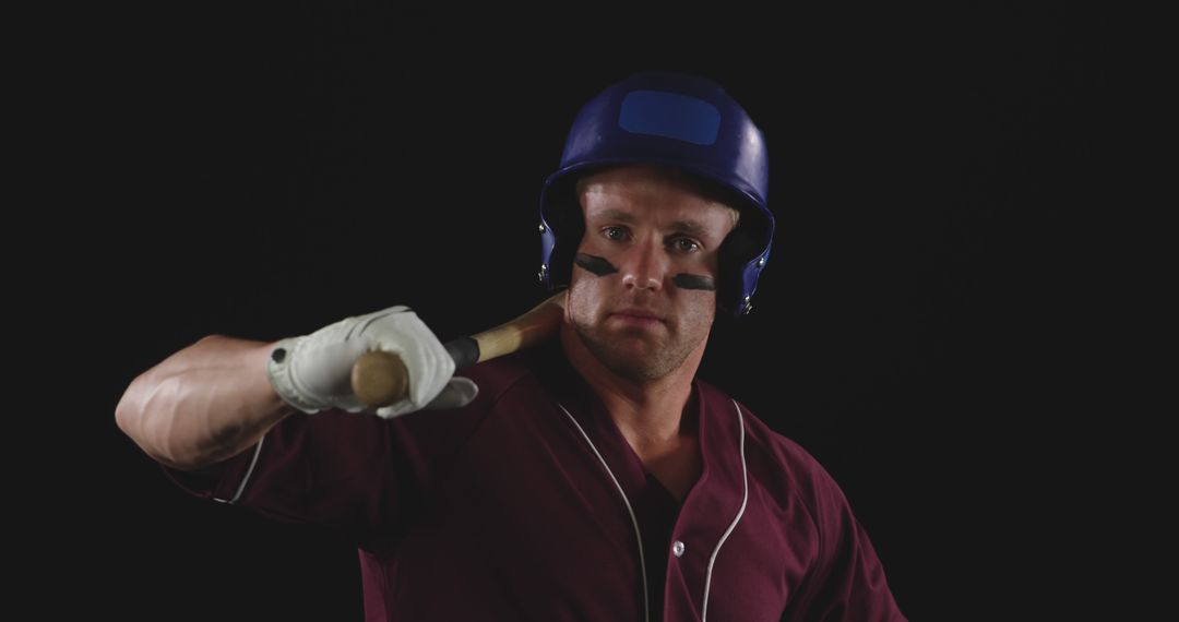 Confident Male Baseball Player Holding Bat in Batting Stance - Free Images, Stock Photos and Pictures on Pikwizard.com