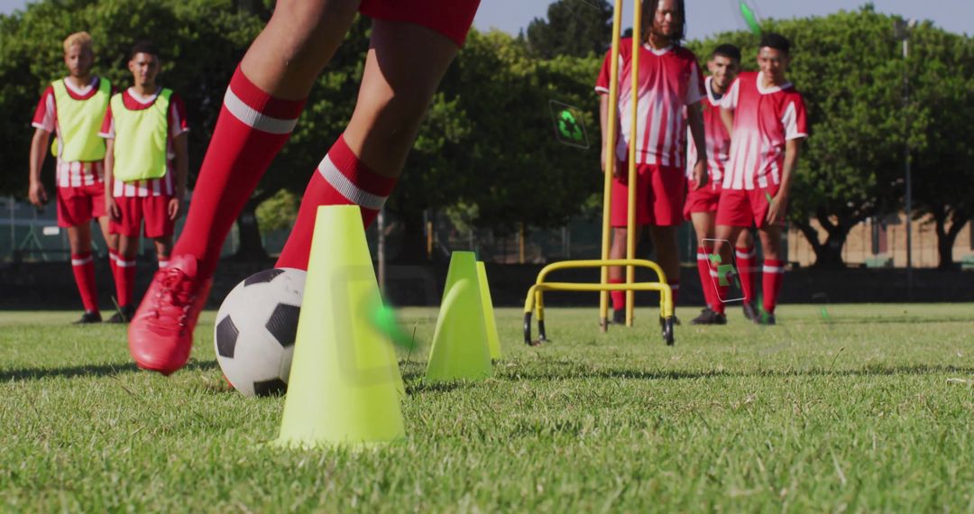 Youth Soccer Team Practicing Agility Drills on Field