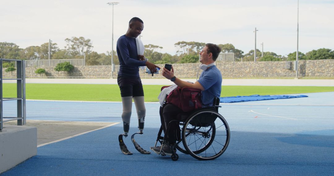 Disabled Athletes Training on Track, One in Wheelchair - Free Images, Stock Photos and Pictures on Pikwizard.com