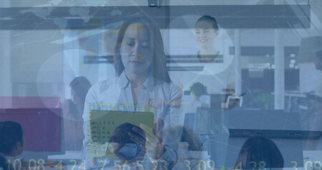 Asian Professional Woman Using Tablet with Overlay of Financial Data in Modern Office