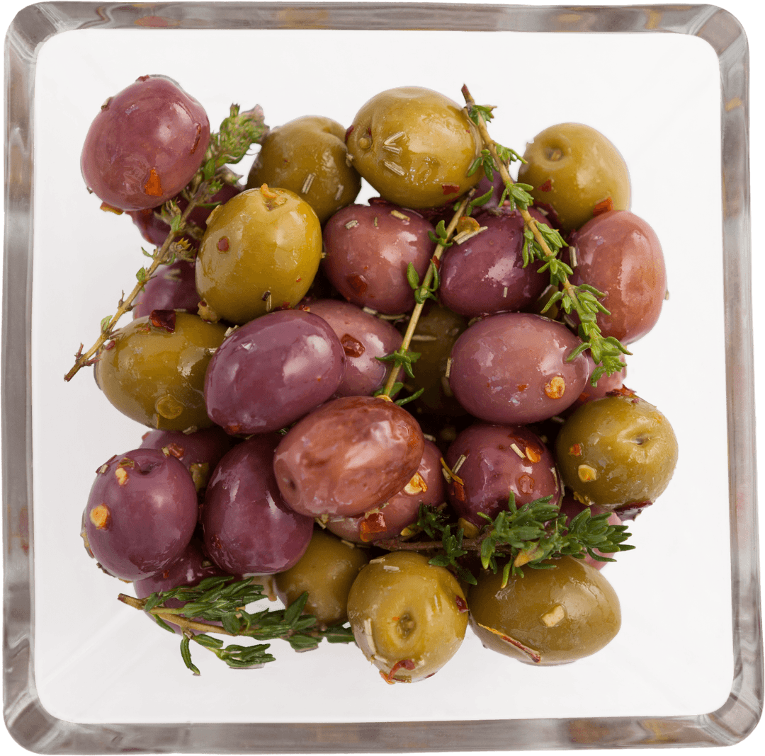 Colorful Mix of Olives with Herbs in Glass Bowl on Transparent Background
