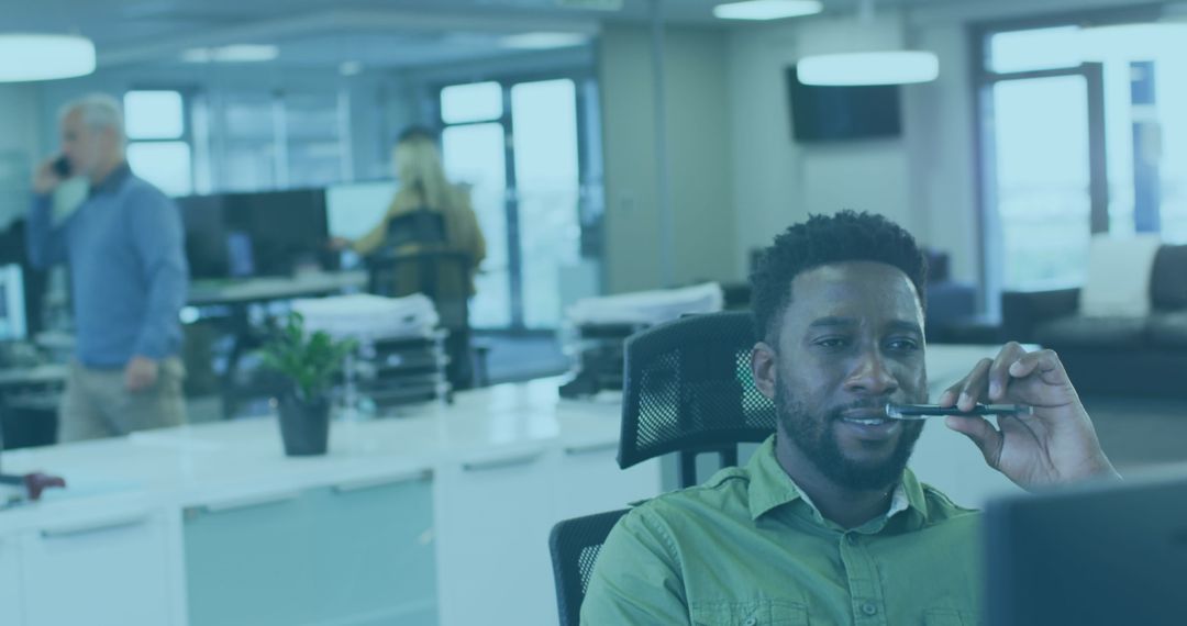 Modern Office Team Collaborating in Open Workspace