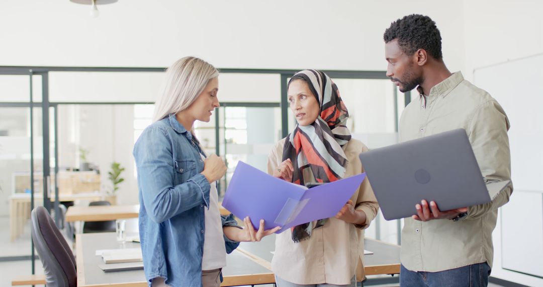 Diverse Office Team Collaborating on Project