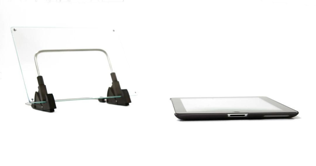 Digital Tablet Displayed with Minimalist Glass Stand