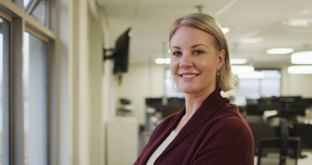 Smiling Professional Businesswoman in Modern Office