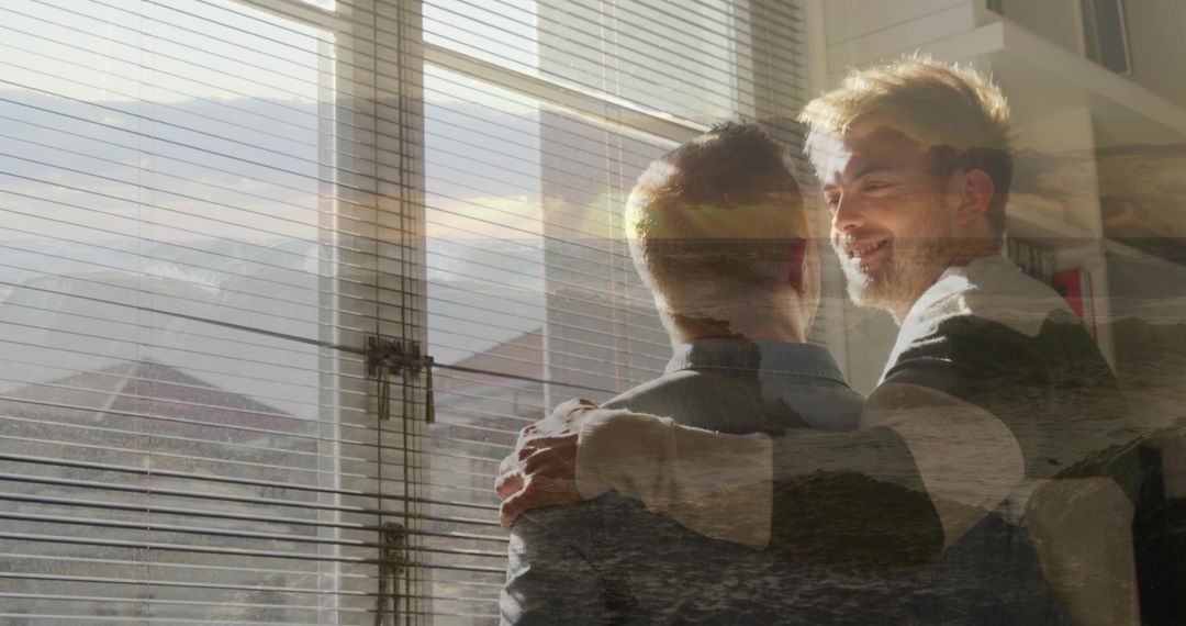 Sunlit Male Couple Embracing by Window with Ocean Double Exposure, Intimate Togetherness