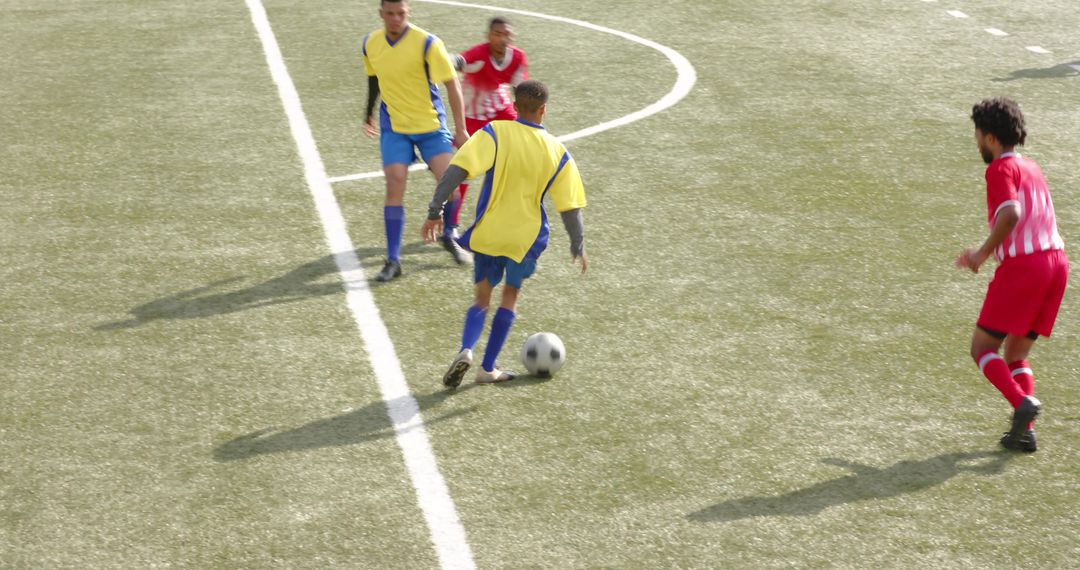 Youth Soccer Players Intense Match Action on Field
