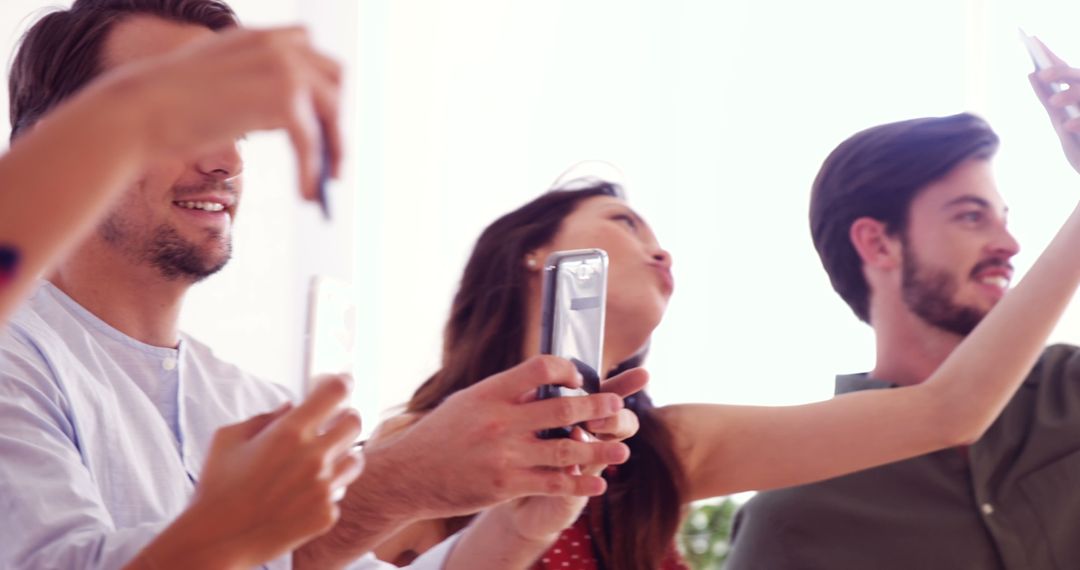 Group of Friends Taking Selfies at Home - Free Images, Stock Photos and Pictures on Pikwizard.com