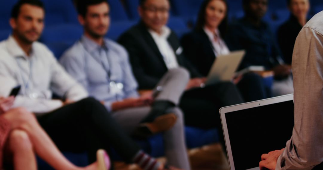 Business Executives Attending Conference in Professional Setting