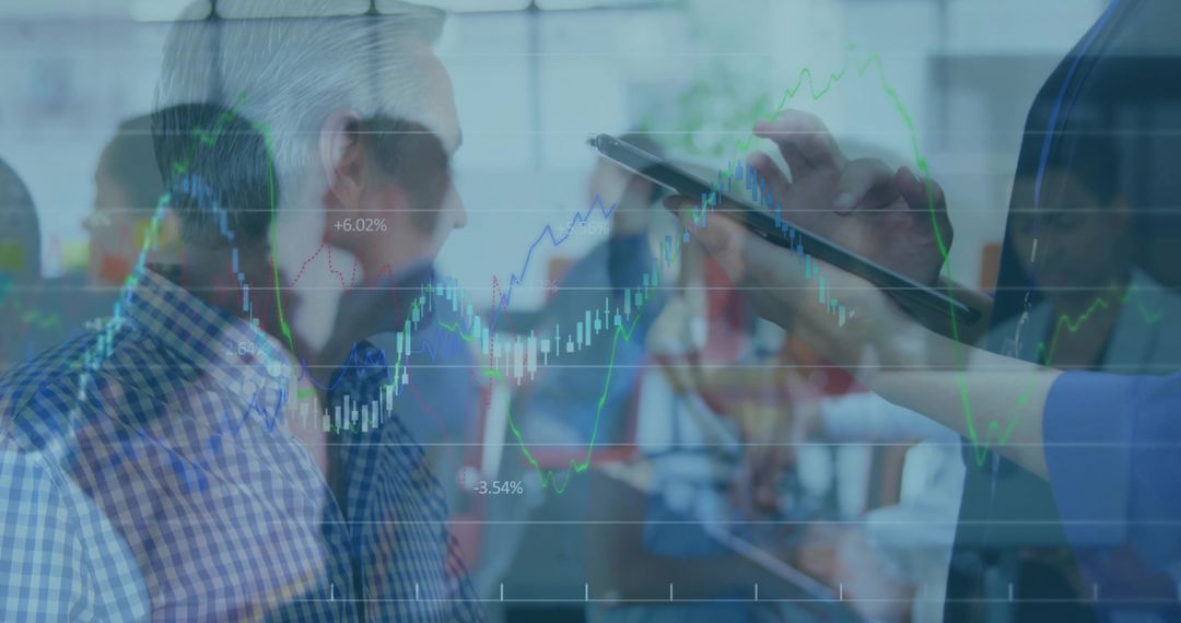 Business team tapping tablet and analyzing financial charts for strategy and growth