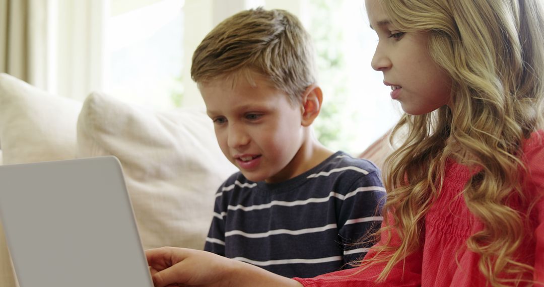 Children Learning Together on Laptop Indoors - Free Images, Stock Photos and Pictures on Pikwizard.com