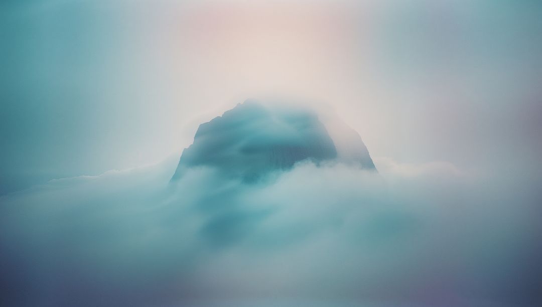 Ethereal Mountain Peak Emerging Above Clouds with Pastel Glow