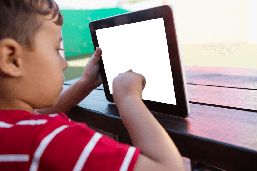 Boy Interacting with Transparent Tablet in Outdoor School Setting