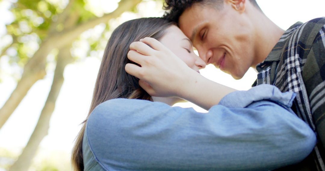 Romantic Couple Embracing in Sunny Garden