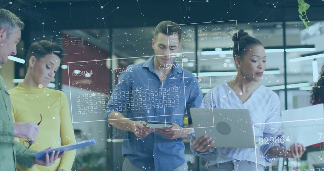 Diverse Business Team Analyzing Digital Interface