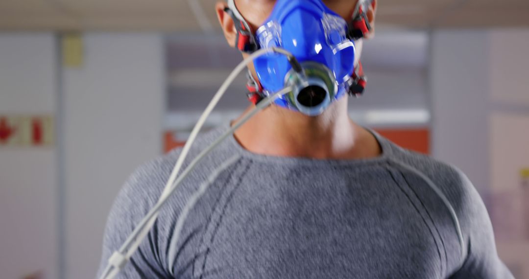 Athlete Running on Treadmill Wearing Respiratory Mask for Fitness Testing - Free Images, Stock Photos and Pictures on Pikwizard.com