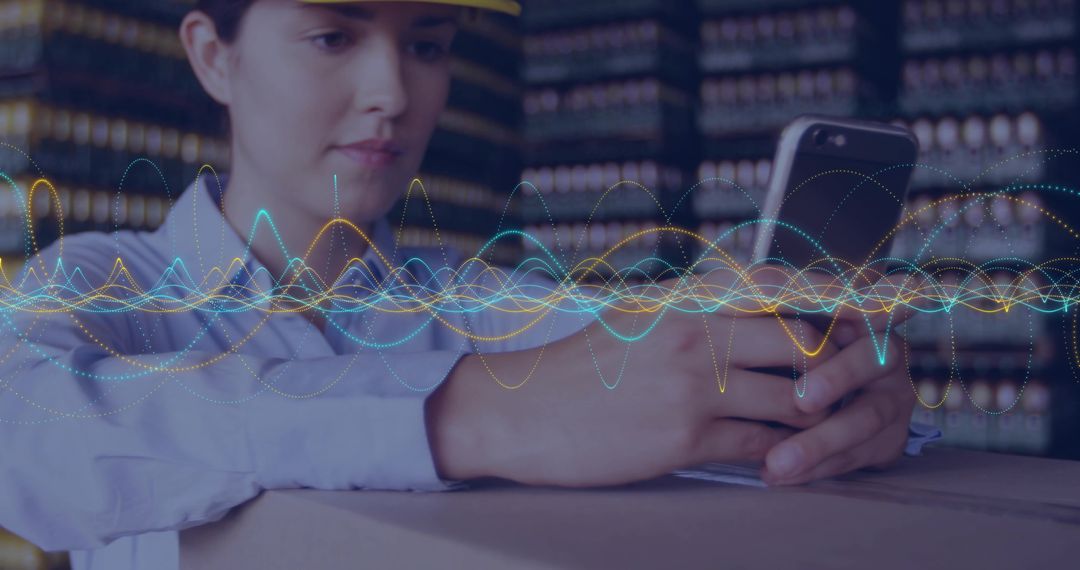 Warehouse worker using smartphone for inventory management with data visualization overlay