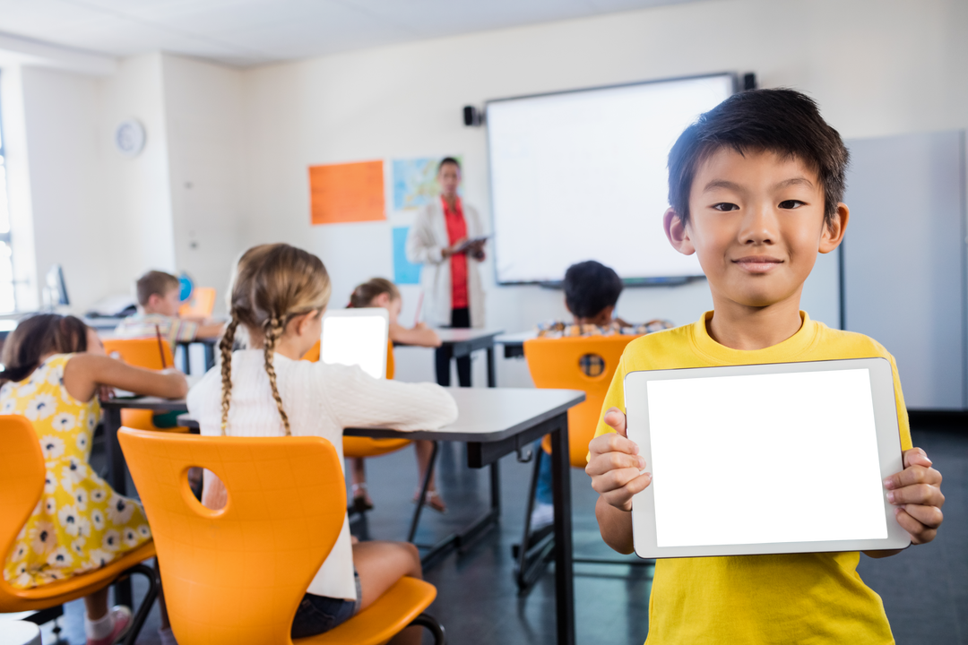 Transparent Tech Savvy Asian Schoolboy Holding Tablet in Classroom - Download Free Stock Images Pikwizard.com