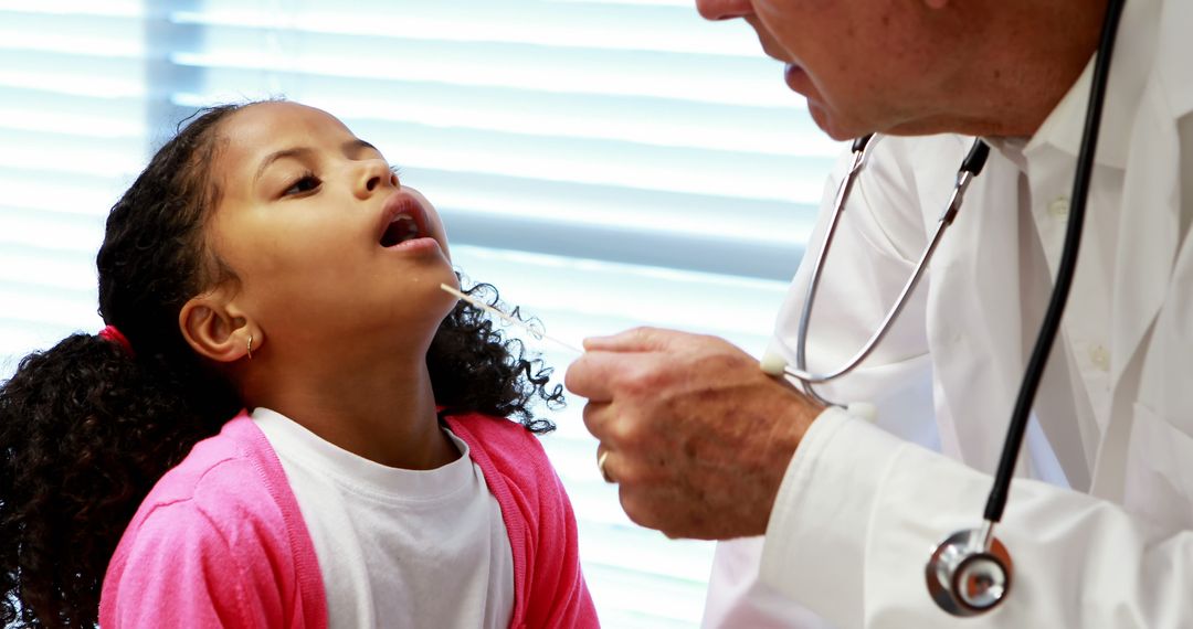 Doctor Examining Little Girl in Medical Office - Free Images, Stock Photos and Pictures on Pikwizard.com