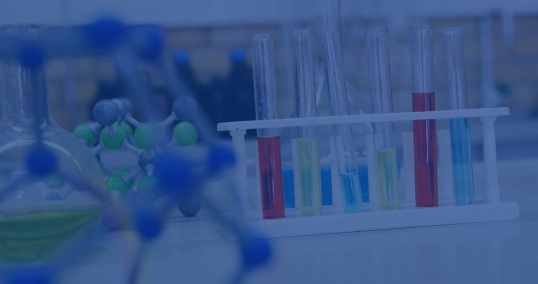 Colored Liquids in Test Tubes with Molecular Models in Laboratory Setting