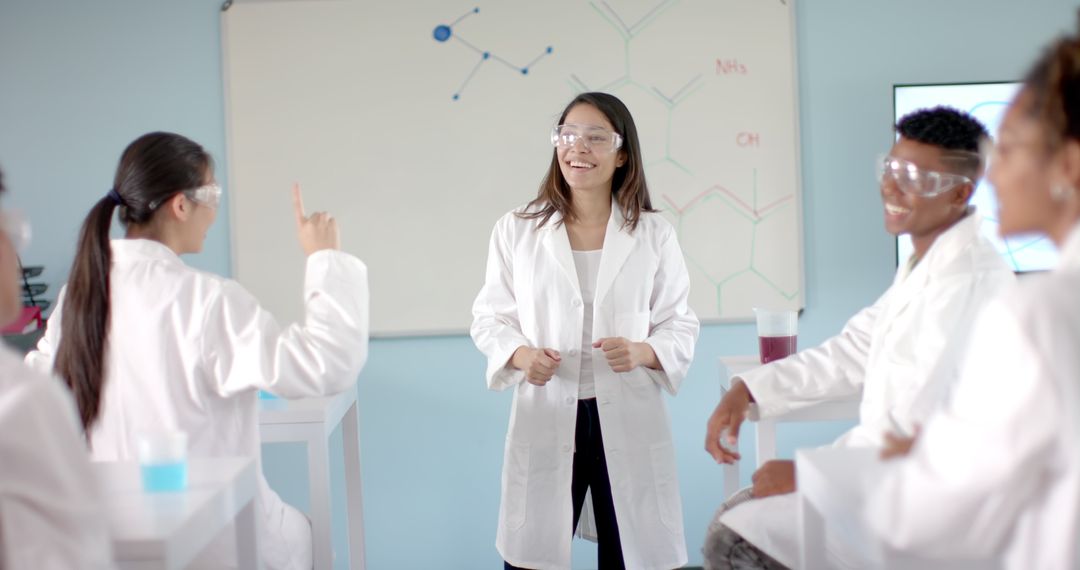 High School Science Class with Diverse Students Conducting Chemistry Experiment