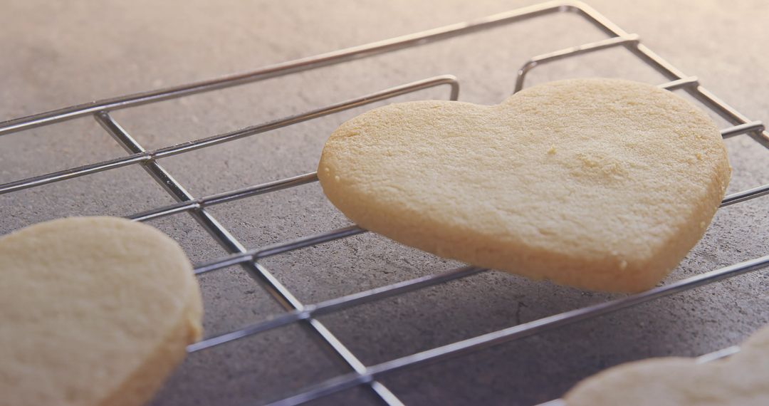 Heart-Shaped Biscuit Cooling on Wire Rack in Natural Light