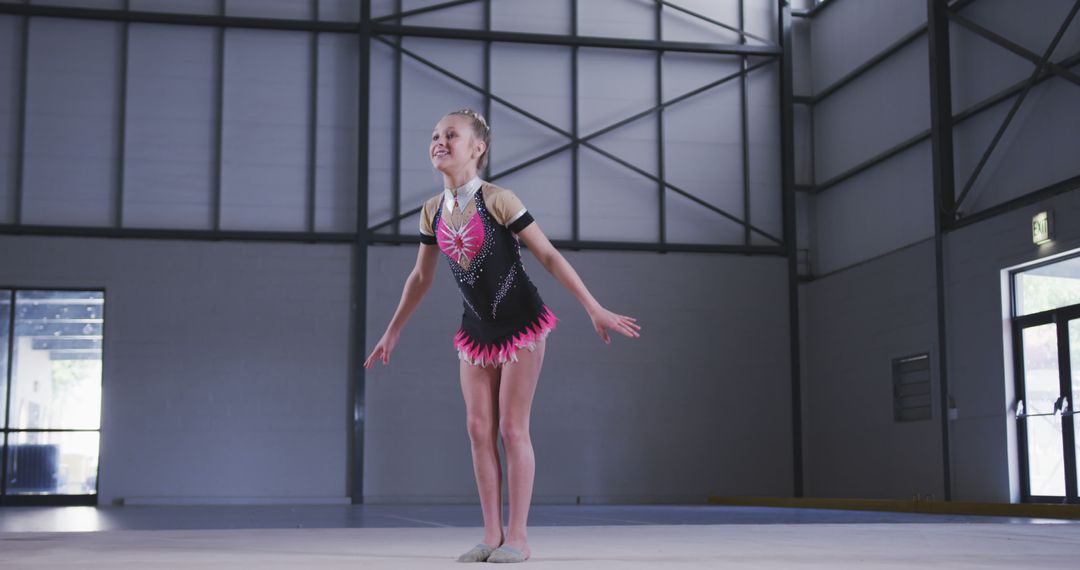 Young Gymnast Performing Routine in Indoor Gymnasium - Free Images, Stock Photos and Pictures on Pikwizard.com