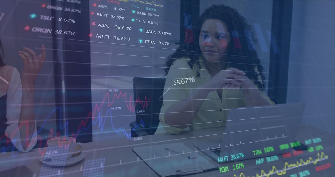 Young Professionals Analyzing Financial Data in Modern Office