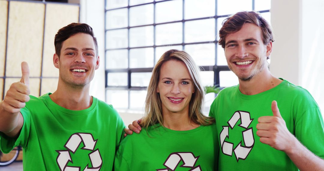 Smiling Environmental Volunteers in Green Recycling T-Shirts - Free Images, Stock Photos and Pictures on Pikwizard.com