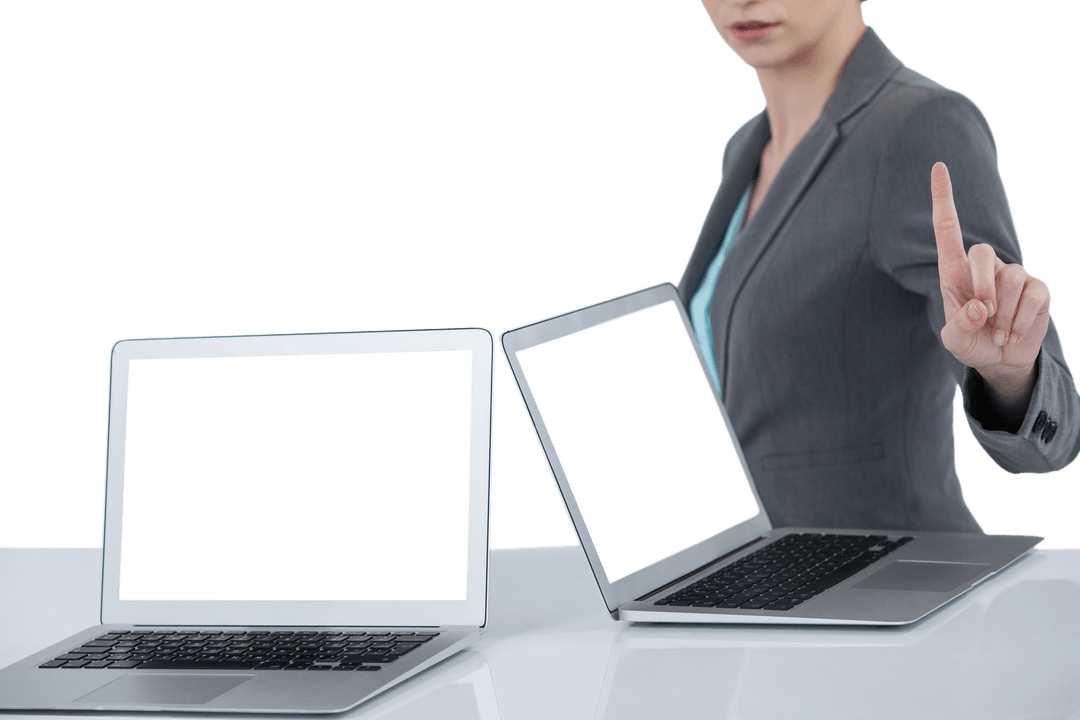 Businesswoman Standing Near Two Laptops with Transparent Background