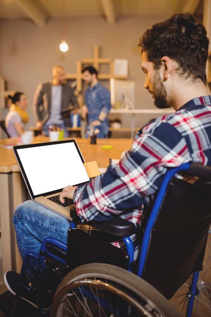 Transparent Image of Caucasian Man in Wheelchair Using Laptop at Office