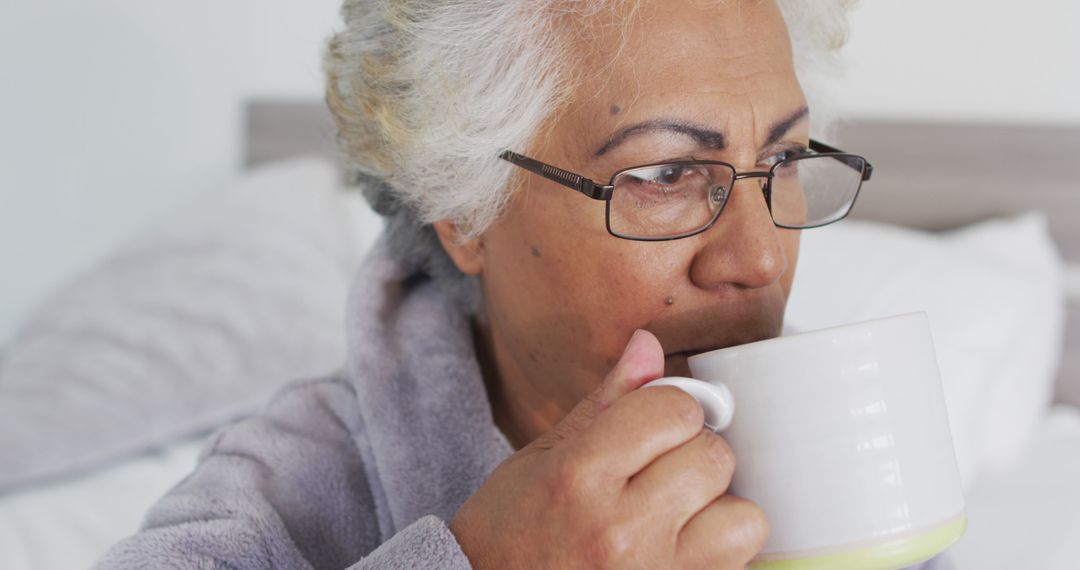 Senior Woman Drinking Coffee at Home in Morning - Free Images, Stock Photos and Pictures on Pikwizard.com