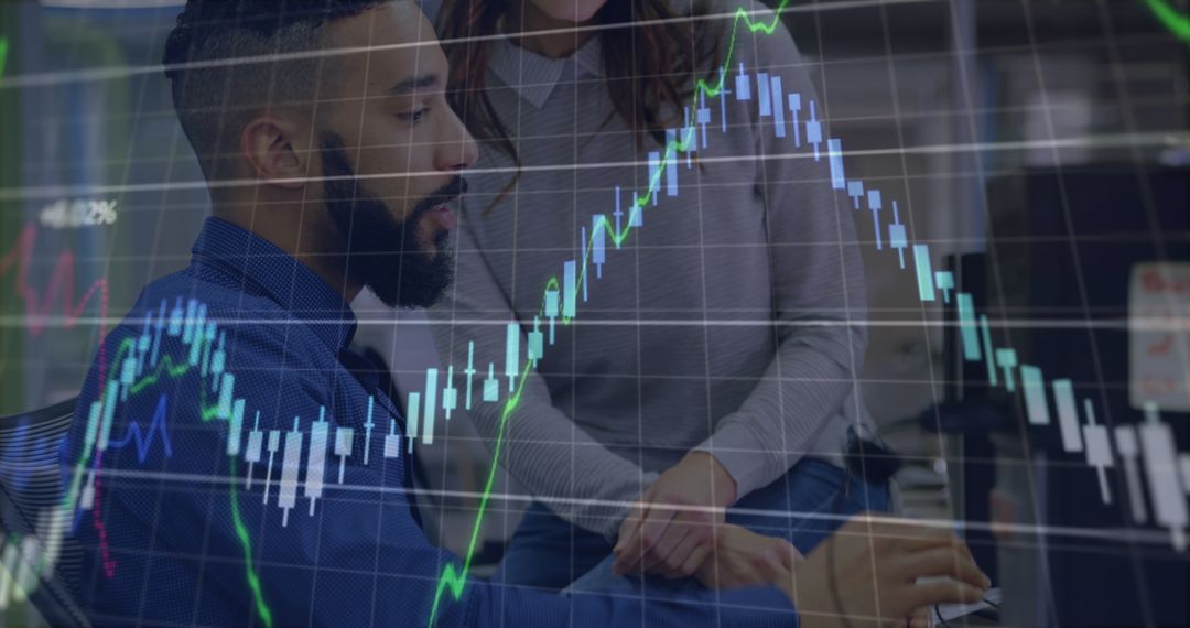 Analyzing Data on Stock Market Graph in Office Environment - Free Images, Stock Photos and Pictures on Pikwizard.com