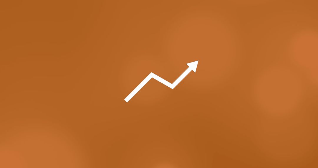 White Arrow on Orange Background Symbolizing Growth
