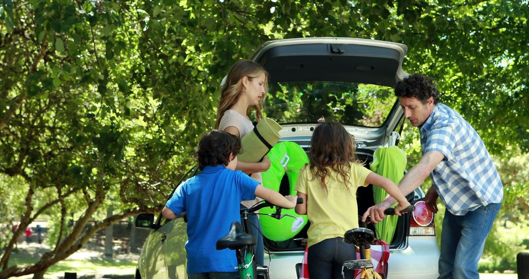 Family Packing Car for Outdoor Cycling Adventure - Free Images, Stock Photos and Pictures on Pikwizard.com