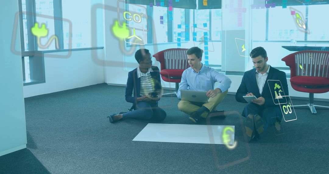 Diverse Team Collaborating with Green Technology in Modern Office