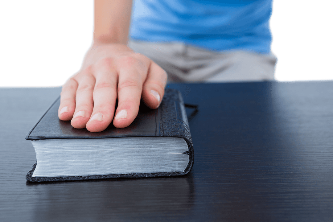 Transparent Image of Person Relating Hand on Bible