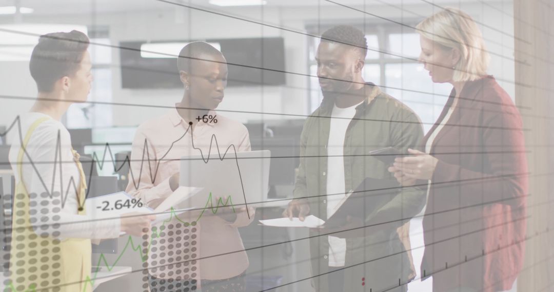 Diverse Business Team Discussing Financial Data Trends in Office